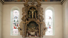 Nederst: Nattverden. Midten: Jesu på korset. Øverst: Den seirende Kristus.