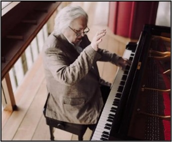 Et bilde som inneholder musikk, keyboard, musikkinstrument, KeyboardKI-generert innhold kan være feil.