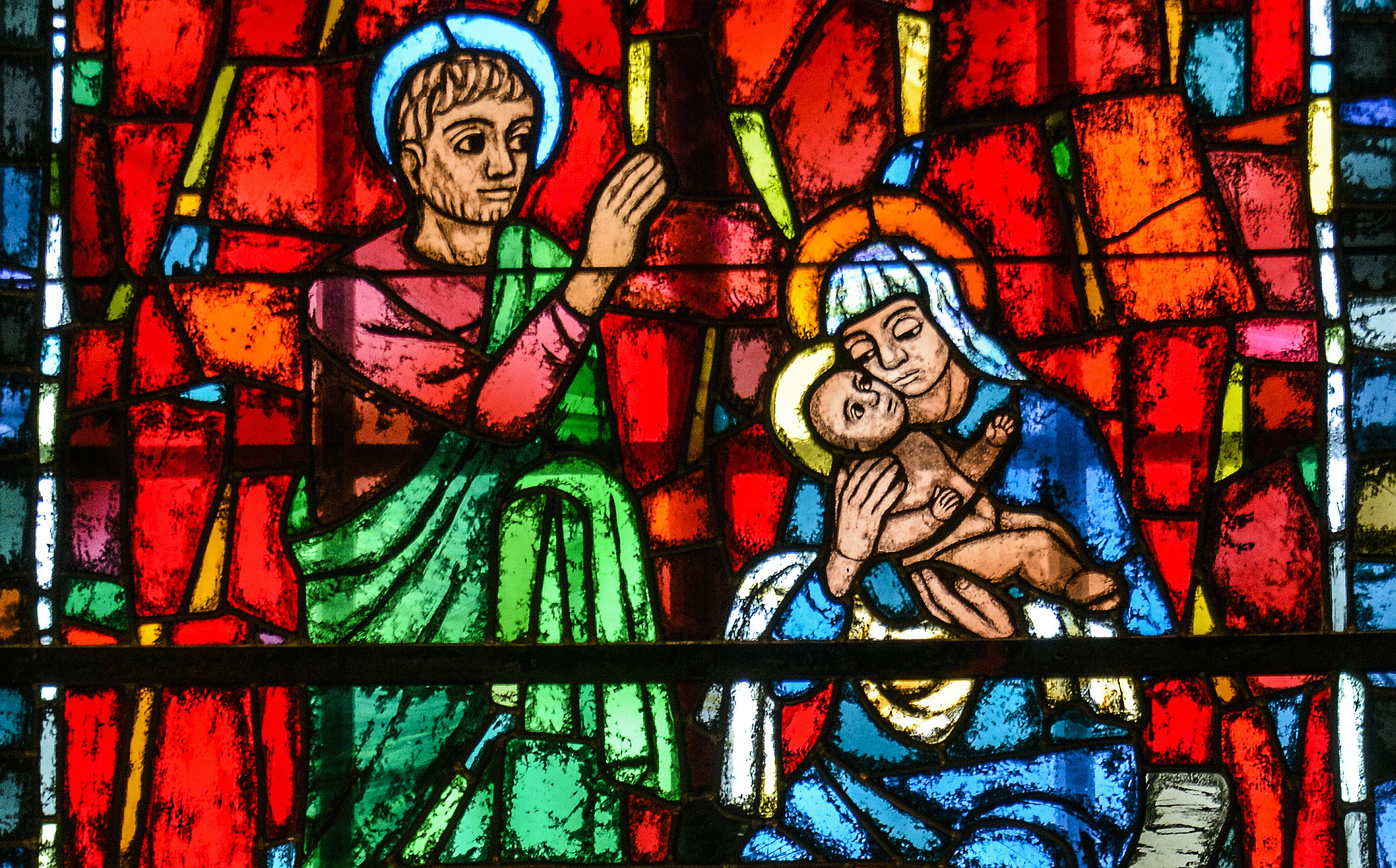 Barnet i Betlehem. Frå Victor Sparre sine glasmåleri i Vistdal kyrkje.