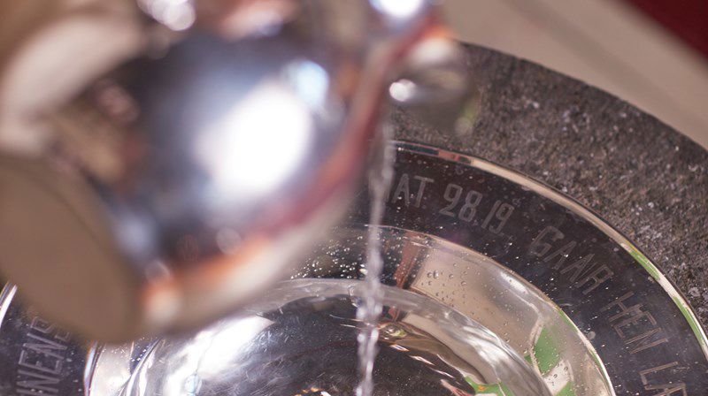 Hva betyr dåpens symboler?