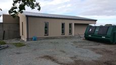 Fasadebilde mot øst med mannskapsavdeling og publikumstoalett