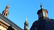 The main tower to the left, the middle tower is at the center of the church. To the right is the tower of the Chapel