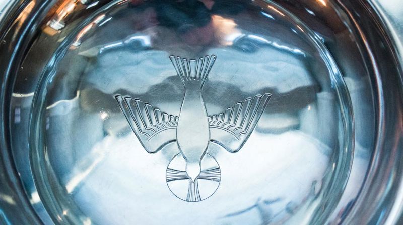 Hva betyr dåpens ord og symboler?