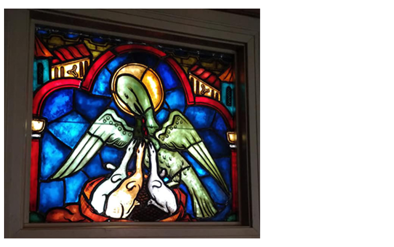 Glasmaleri i Volbu kyrkje av Rolf Klemetsrud. Foto: Eli Vatn