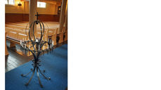 Lysglobe i Rogne kyrkje. Foto: Saskia Aleida Van Veen