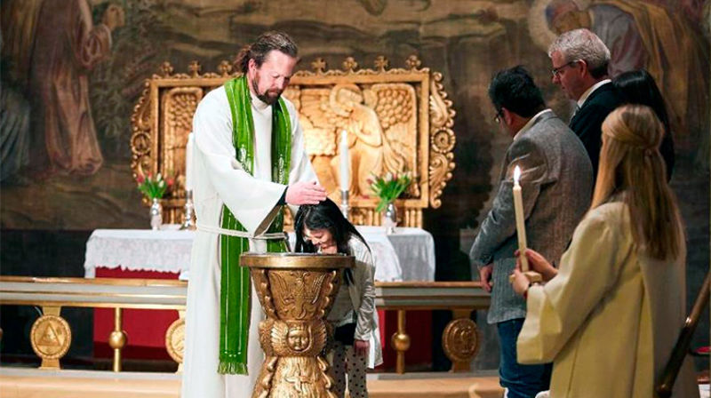 Illustrasjonsfoto -  Dåp i Ila kirke i Oslo. (Foto: Sveinung Bråthen/Kirkerådet)